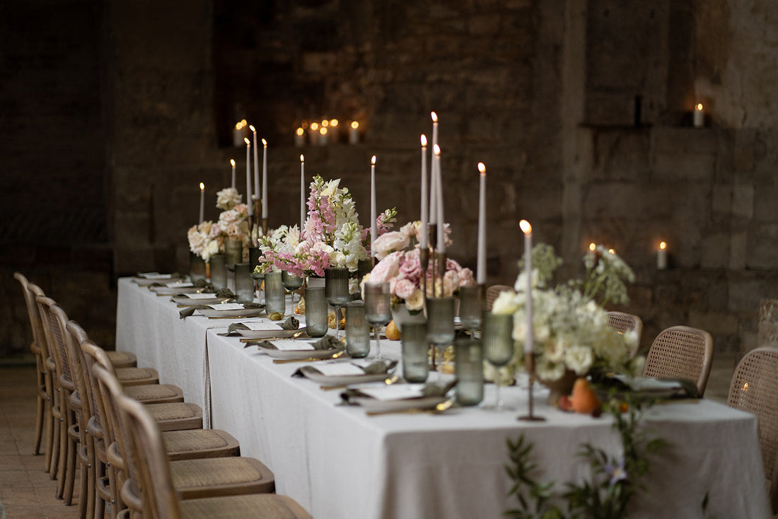 What a Host Home: Wedding Tablescape with gold cutlery, linen table napkins, porcelain round plates, gold candle holders