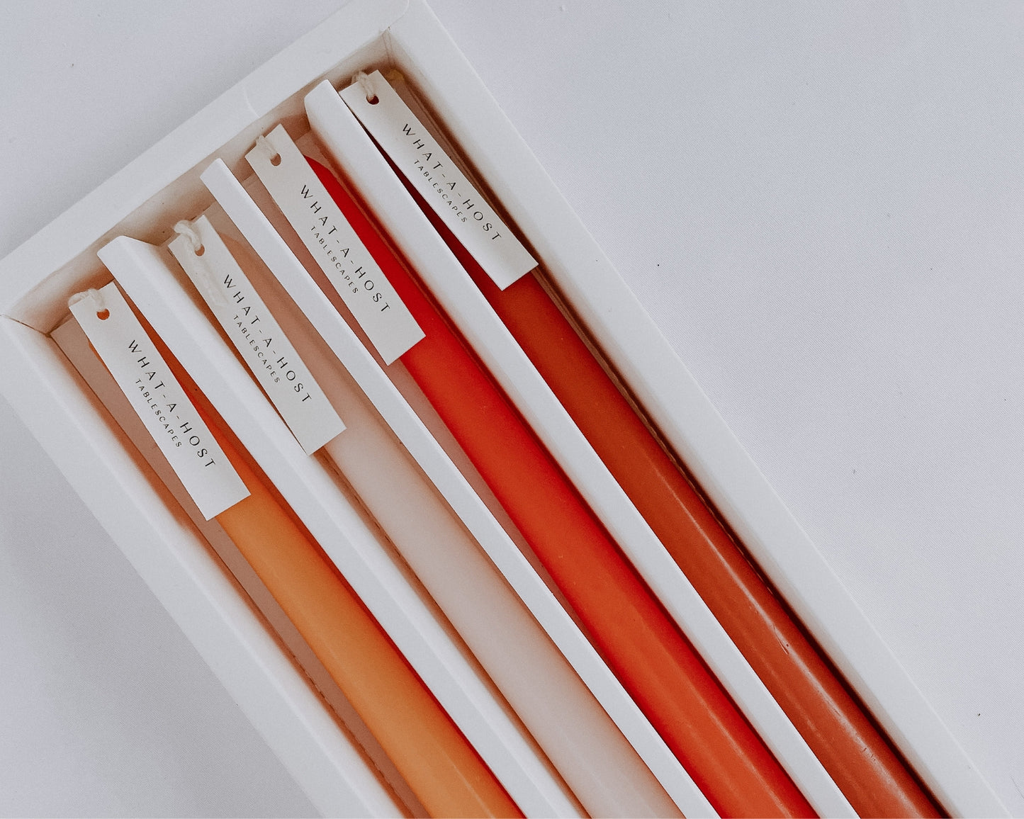 Orange Scented Taper Candles from What a Host Home Decor