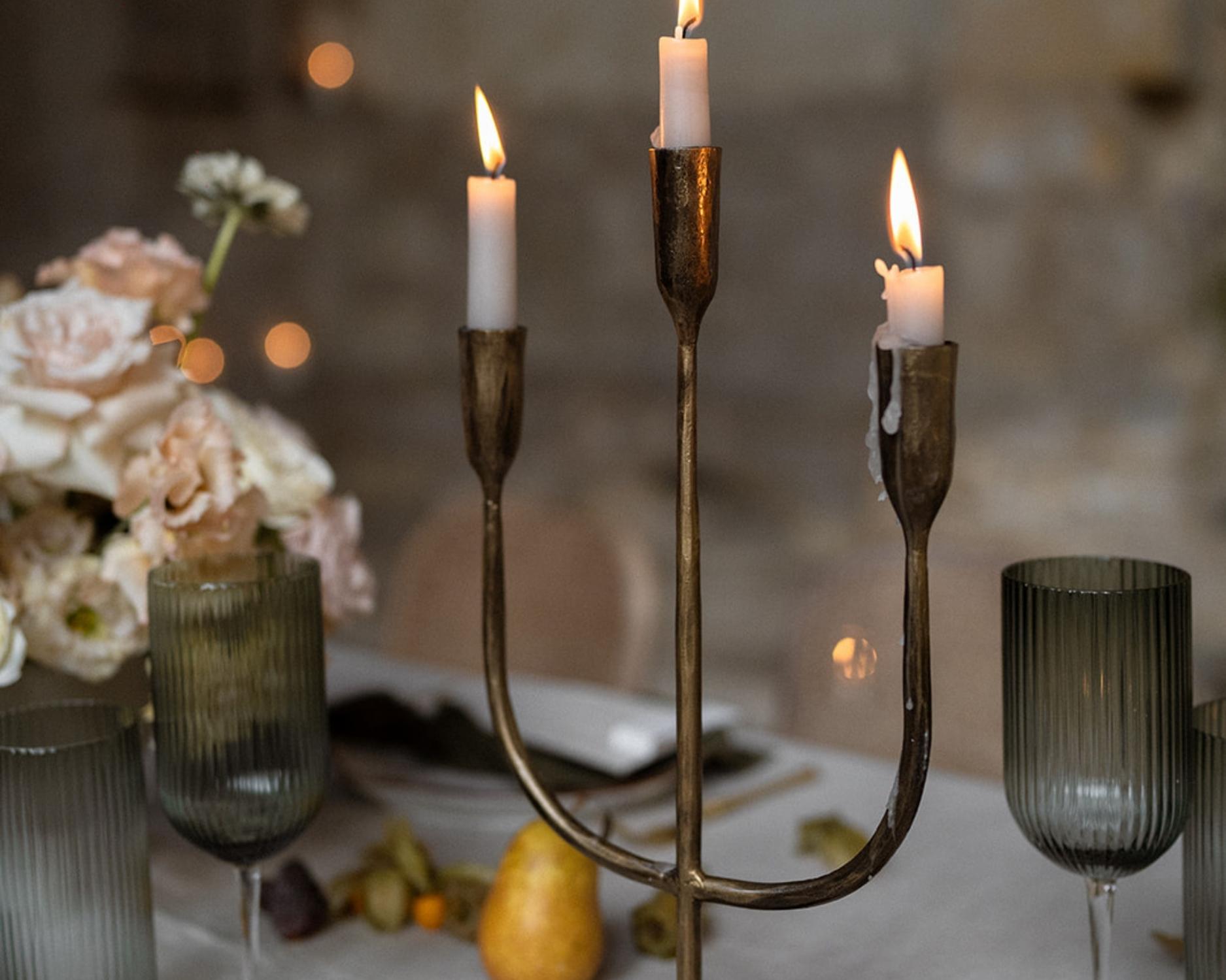 Rustic Antique Trident Brass Candelabra in gold from What a Host Home