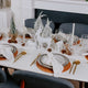What a Host Home Decor: Christmas Tablescape with White Deers, Snowed Christmas Table Trees, Rattan Placemats, Cotton Gauze Table Textiles and Stainless Steel Gold Cutlery