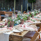 Wedding Tablescape: High quality table design with tableware, gold cutlery sets, cotton table runner and napkins, iron candle holders and round rattan placemats from What a Host Home and Hygge Decor
