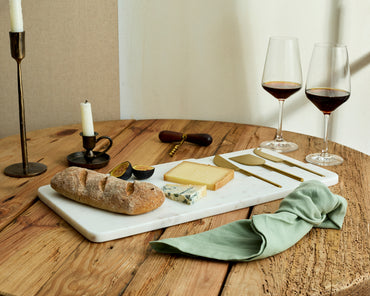Polished White Marble Cheese and Charcuterie Board with Cheese Cutlery Set in Stainless Steel from What a Host Home
