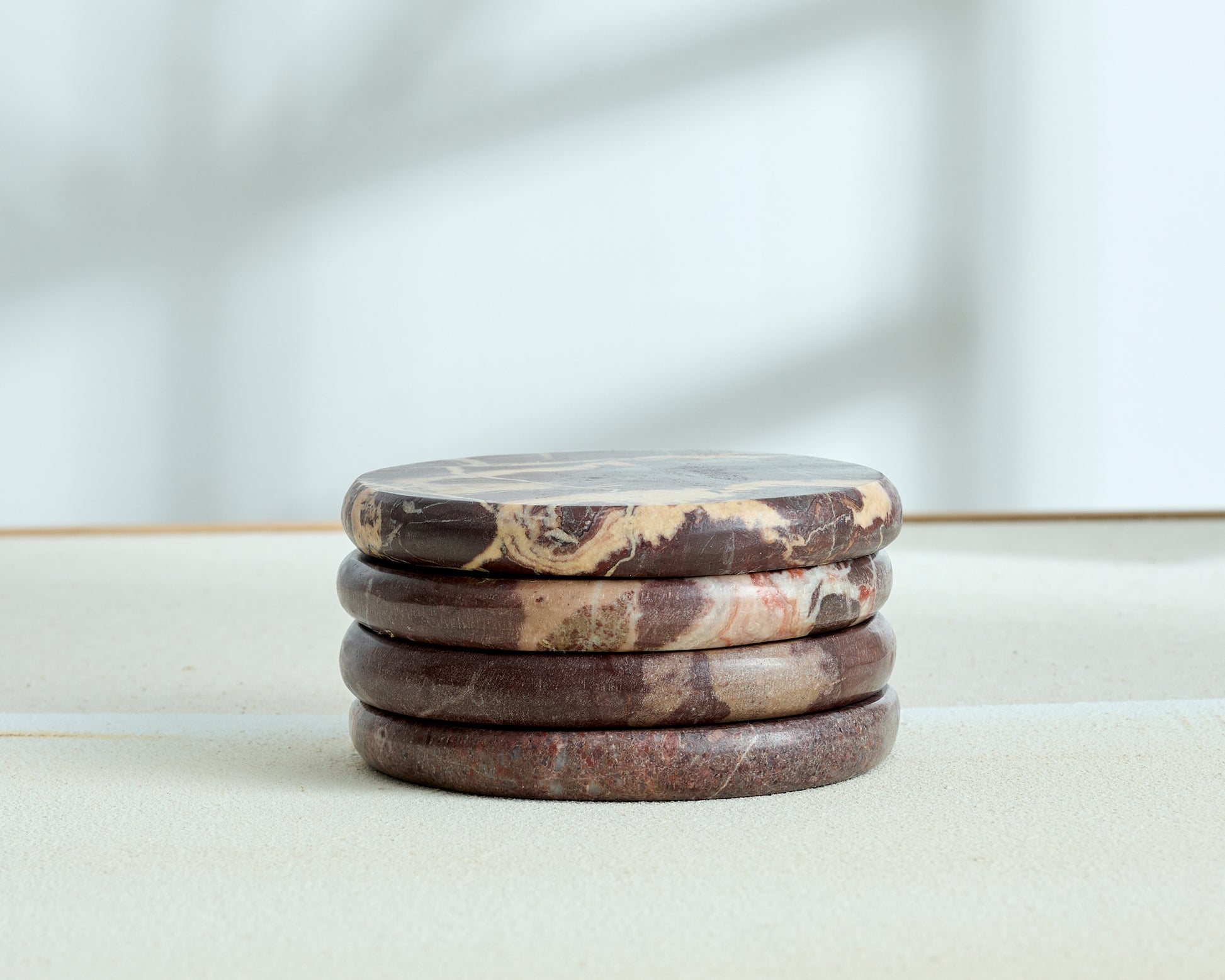 Modern Round Shape Rosso Levanto Polished Marble Coasters from What a Host Home
