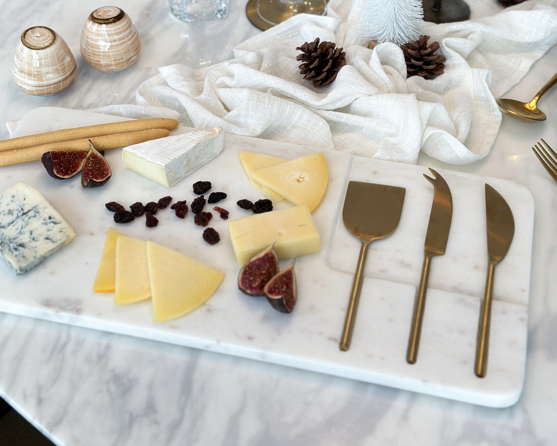 Polished Modern White Marble Cheese and Charcuterie Board with Cheese Cutlery Set in Stainless Steel from What a Host Home