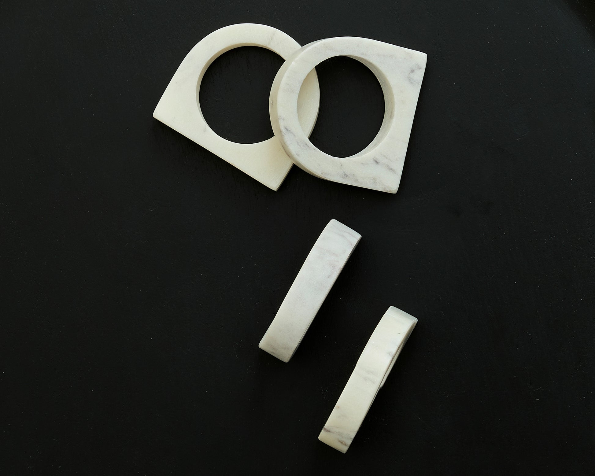 Polished Marble Napkin Rings in White Irregular Shape from What a Host Home