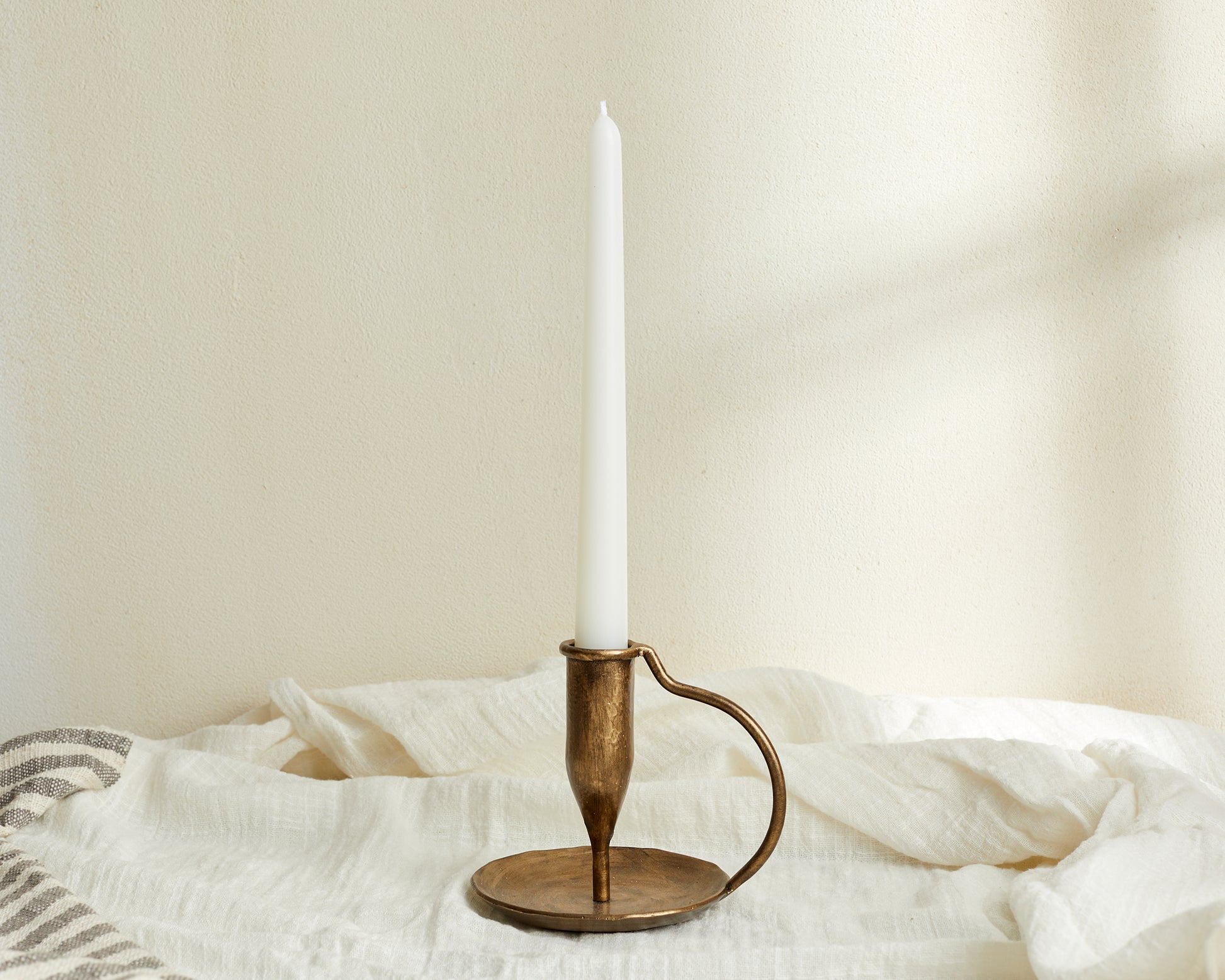 Rustic Iron Candle Holder with Handle in Gold from What a Host Home