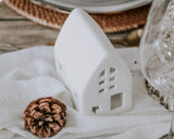 Christmas White Scandi House Candle Holder from What a Host Home Decor. Seasonal Table Decor.
