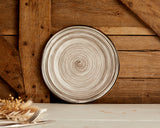 Modern Boho Round Porcelain Plate with Spirals From What a Host Home Decor